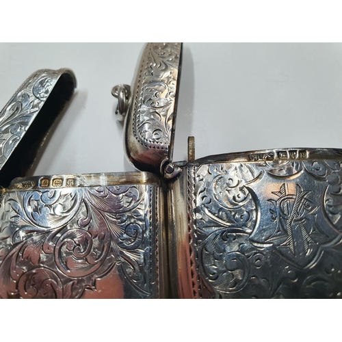 124 - 2 - Early 20thC hallmarked silver vesta cases, both heavily engraved,

Total combined weight approx ... 