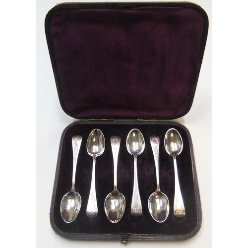 103 - Antique set of British silver tea spoons with extensive matching engraved handles