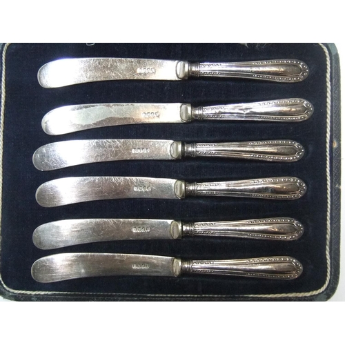 104 - Cased set of Antique British silver handled knives