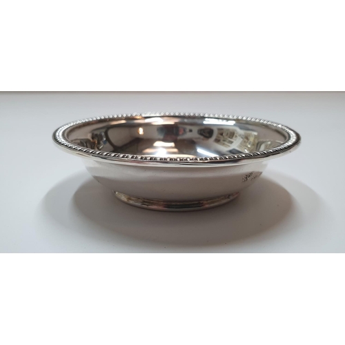 106 - Garrards silver pin dish, 

62 grams