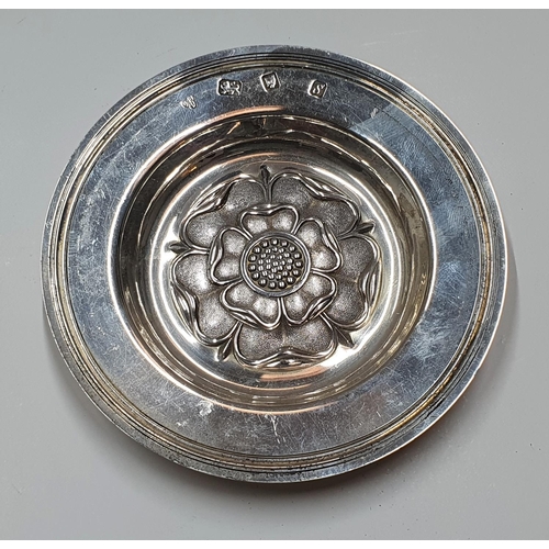 108 - Hallmarked 20thC circular silver dish embossed with the English rose and extensively engraved to und... 