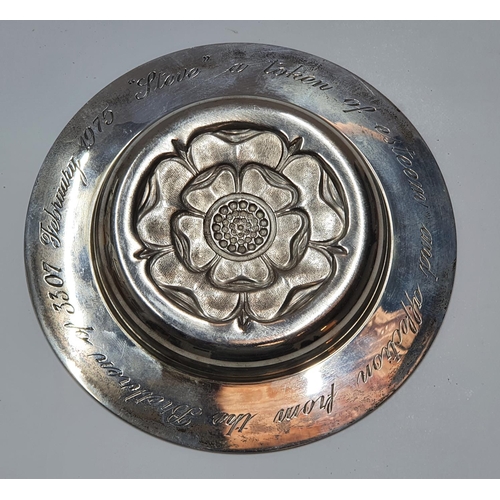 108 - Hallmarked 20thC circular silver dish embossed with the English rose and extensively engraved to und... 