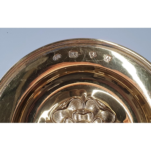 109 - Hallmarked silver gilt, 1963 circular dish embossed with an English rose by Hickleton & Phillips