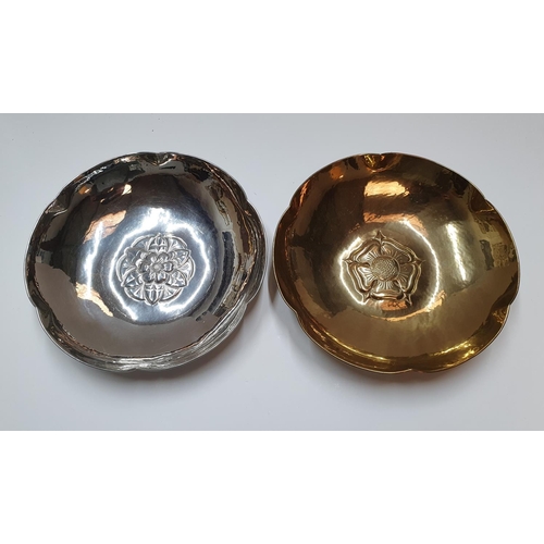 42 - 2 circular metal bowls, both with matching English rose motifs and stamped Keswick KSIA,

Both measu... 