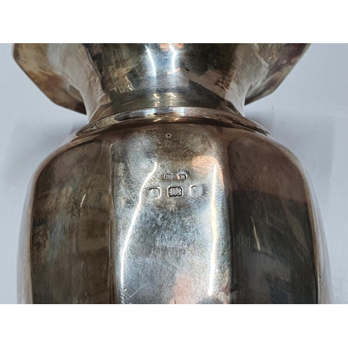 111 - Early 20thC hallmarked silver vase in plain form,

160 grams,            21 cm tall