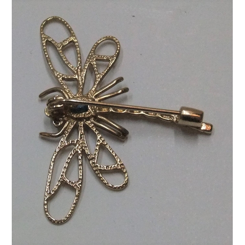 82 - 9ct yellow gold dragonfly brooch with topaz back & 2 small diamonds for eyes,

3.6 grams gross