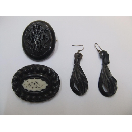 67 - Victorian Whitby jet ladies jewellery mourning set to include an ornately carved choker, earrings & ... 