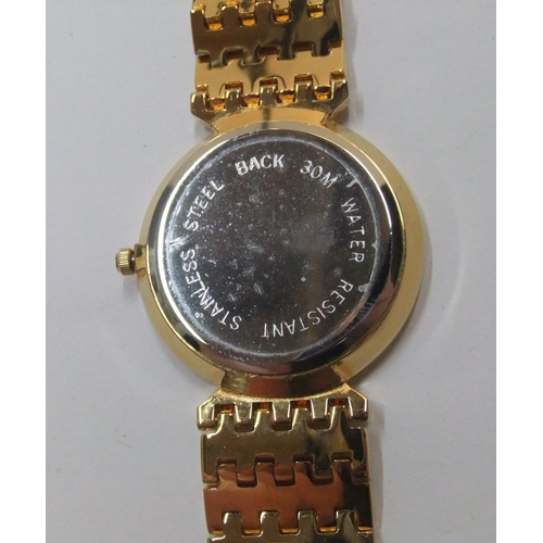 93 - Vintage ladies Warwick Watch Co gold plated with metal strap,

Never worn, still in original box