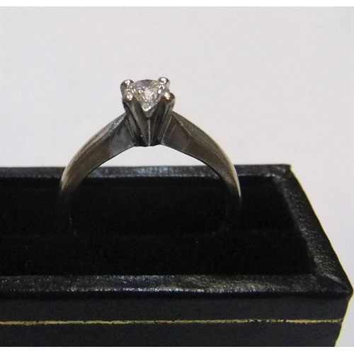 83 - 18ct white gold diamond solitaire ring (approx 0.2ct)

Approx 3.1 grams gross,         size I