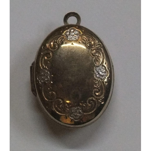 54 - 9ct bi-coloured gold ladies locket

approx 1.5 grams