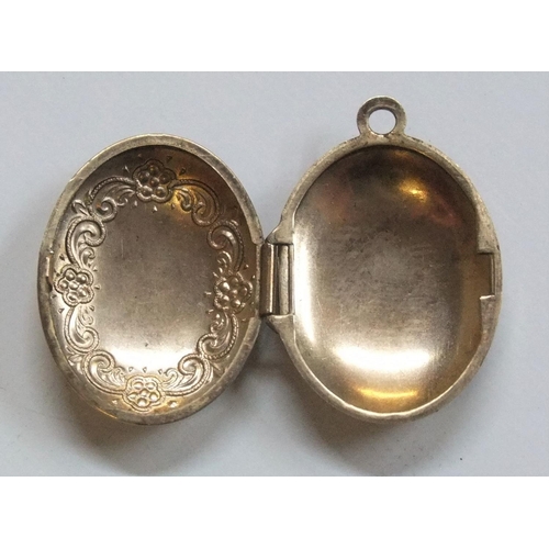 54 - 9ct bi-coloured gold ladies locket

approx 1.5 grams