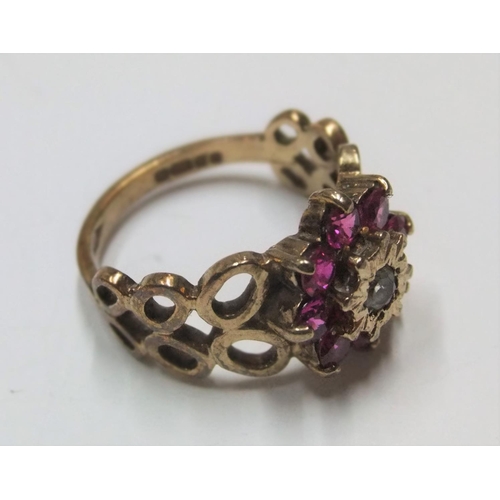 56 - Modernist 9ct yellow gold ruby cluster ring with unusual circular shoulders

Approx 3.2 grams gross,... 