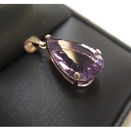 44 - Large solitaire pear cut amethyst set in 9ct yellow imported gold

Aprrox 1.3 grams gross,