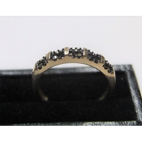 45 - unmarked/untested yellow gold ring with 20 small round cut black diamonds

 Approx 1.7 grams gross, ... 