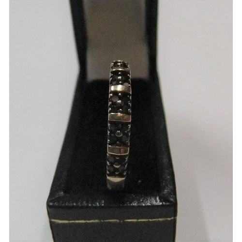 45 - unmarked/untested yellow gold ring with 20 small round cut black diamonds

 Approx 1.7 grams gross, ... 