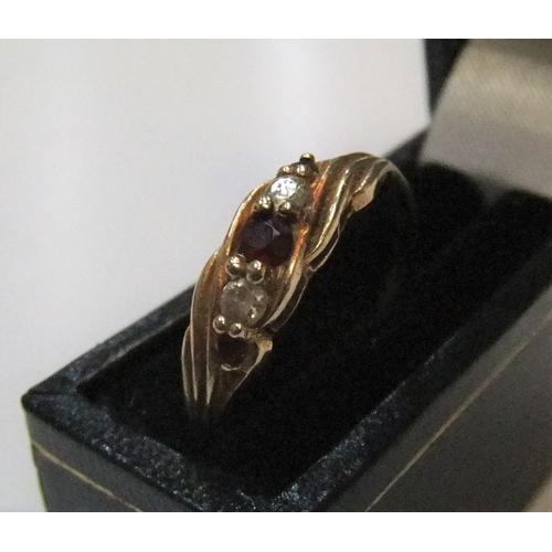 48 - 9ct yellow gold diamond & garnet ring

Approx 1.5 grams gross,             size Q