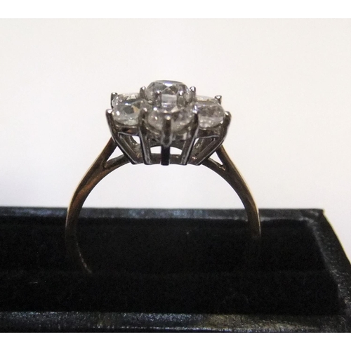 49 - 9ct yellow gold, CZ cluster ring

Approx 2.7 grams gross,            size M