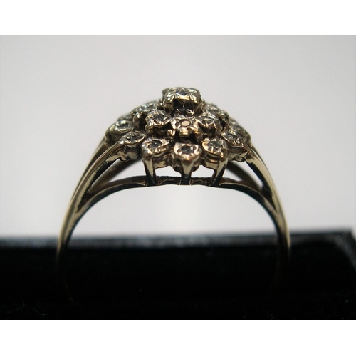 57 - 9ct yellow gold & diamond cluster ring

Approx 2.1 grams gross             size Q