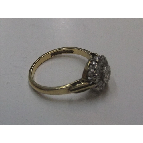 78 - 18ct gold with platinum setting, circular diamond set cluster ring

Approx 3.8 grams gross          ... 