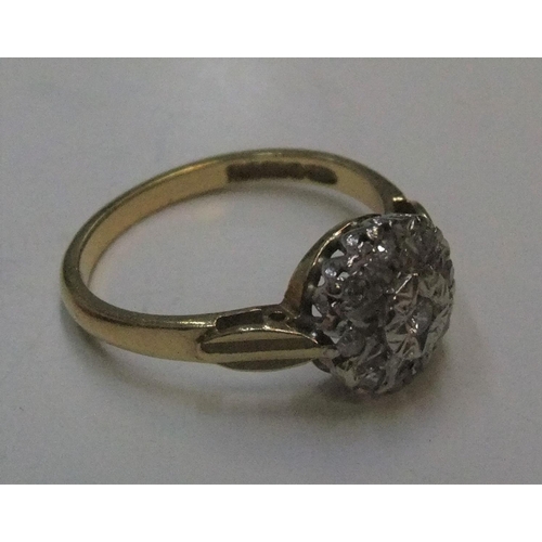 78 - 18ct gold with platinum setting, circular diamond set cluster ring

Approx 3.8 grams gross          ... 