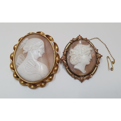 99 - 2 Large antique cameo brooches