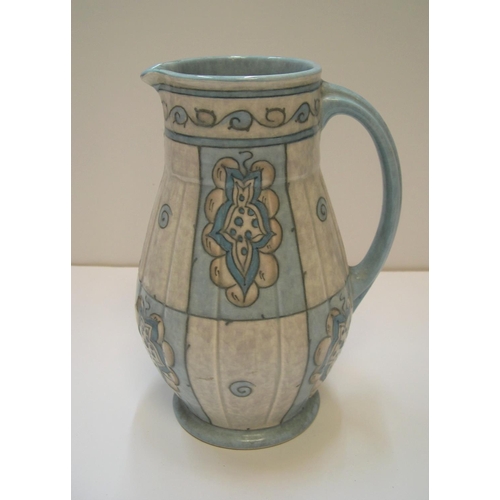 163 - Rare Charlotte Rhead Burley Ware jug in blue, marked TL31 to base.

Unusual blue colourings

23 cm h... 