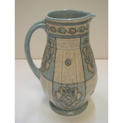 163 - Rare Charlotte Rhead Burley Ware jug in blue, marked TL31 to base.

Unusual blue colourings

23 cm h... 