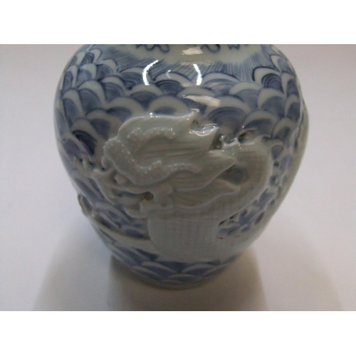 174 - Chinese 20thC single stem, unusual light B&W vase with white dragon decoration, stamped mark to base... 