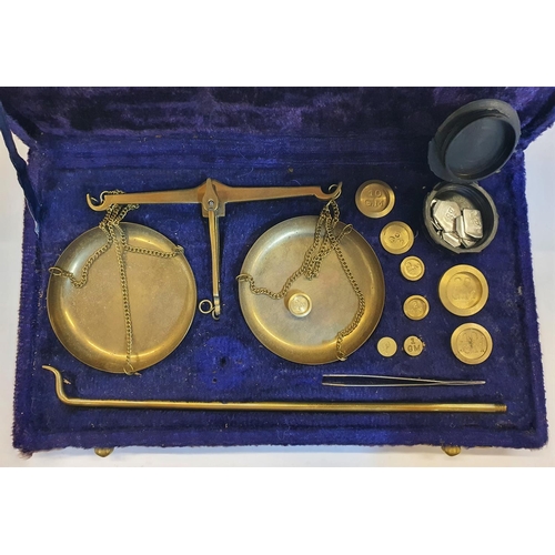 21 - Cased set of Scales and weights complete with wooden screw in base
