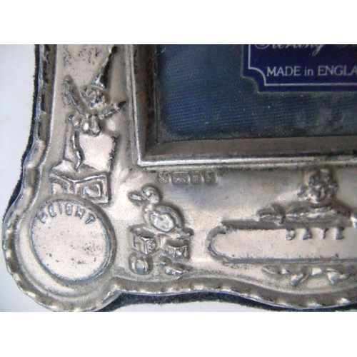 87 - Small silver fronted photo frame

12 x 11 cm