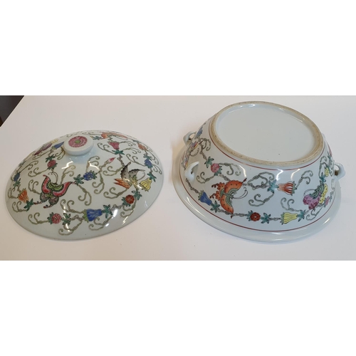 39 - Good quality, unmarked, circular serving pot with lid, the pot decorated with butterflies & flowers