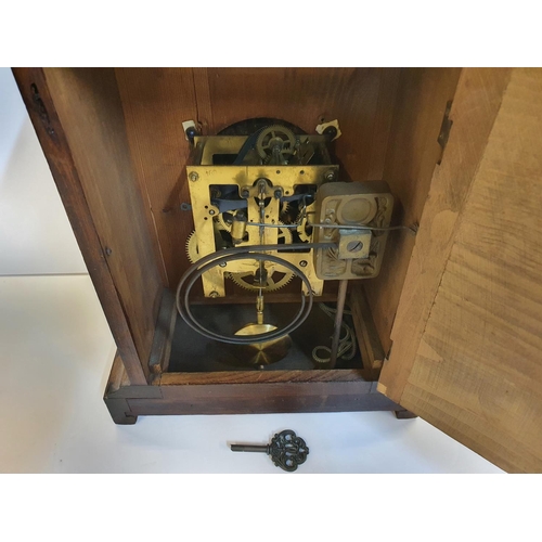 101 - 2 mantle clocks, 1 small gilt metal the other, traditional style wooden, complete with winder key