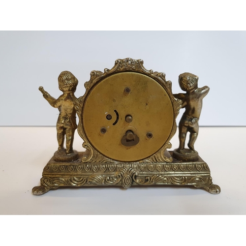 101 - 2 mantle clocks, 1 small gilt metal the other, traditional style wooden, complete with winder key