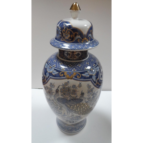 27 - 20thC Chinese lidded vase with matching Peacock decoration

The vase is 33 cm tall

The vase is in f... 