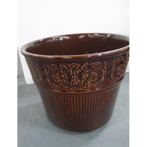 65 - Brown glazed 2-part jardinière in good condition