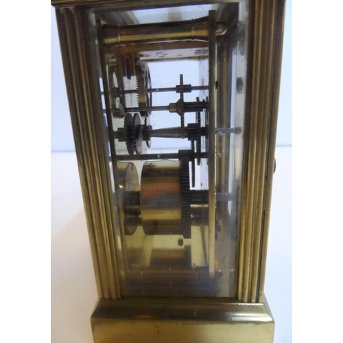 75 - Unmarked 20thC brass cased carriage clock timepiece, with key,

Believed to be in full working order... 