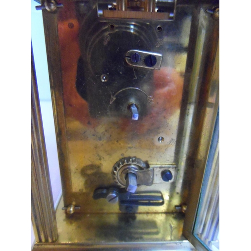 75 - Unmarked 20thC brass cased carriage clock timepiece, with key,

Believed to be in full working order... 