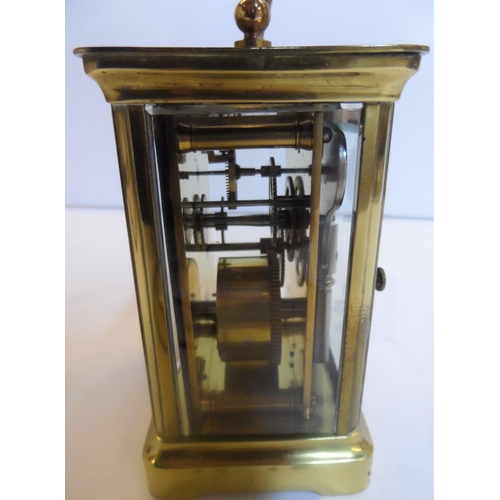 76 - Unmarked 20thC brass cased carriage clock timepiece, with key,

Believed to be in full working order... 