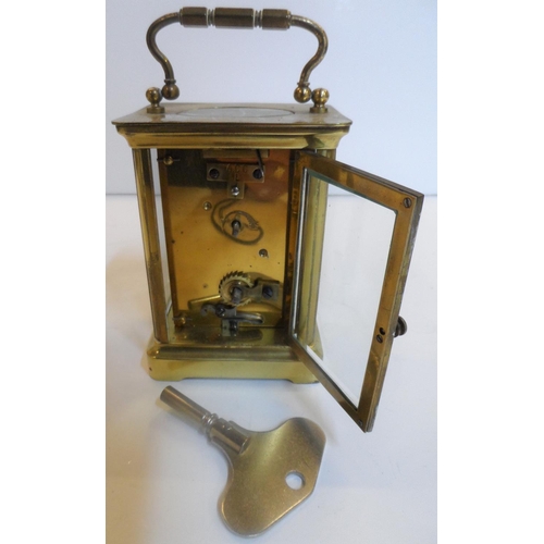 76 - Unmarked 20thC brass cased carriage clock timepiece, with key,

Believed to be in full working order... 