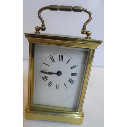 76 - Unmarked 20thC brass cased carriage clock timepiece, with key,

Believed to be in full working order... 