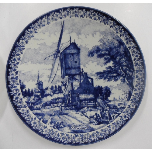 35 - Large early/mid 20thC Pair of Delft ceramic circular hanging wall plates after De Zomen (2),

Both p... 