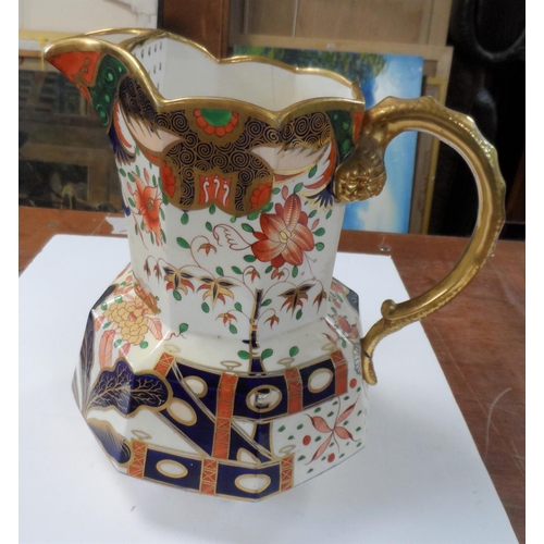 169 - Fine quality, unmarked Victorian water jug decorated extensively in Imari style pattern,

25 cm high