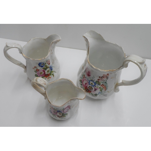 187 - Set of 3 graduating ceramic Victorian jugs, all hand painted & all signed & dated 