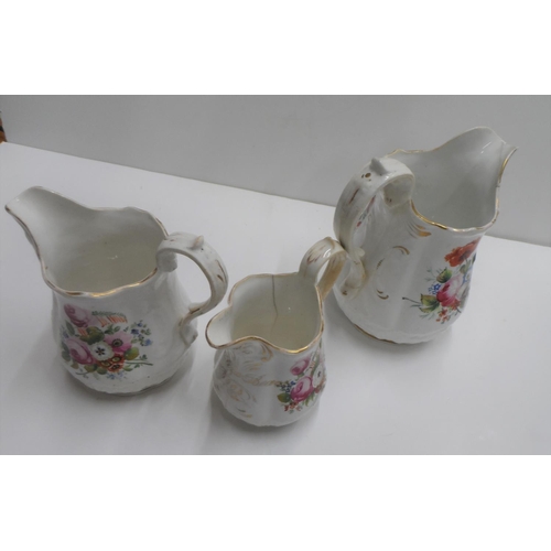 187 - Set of 3 graduating ceramic Victorian jugs, all hand painted & all signed & dated 