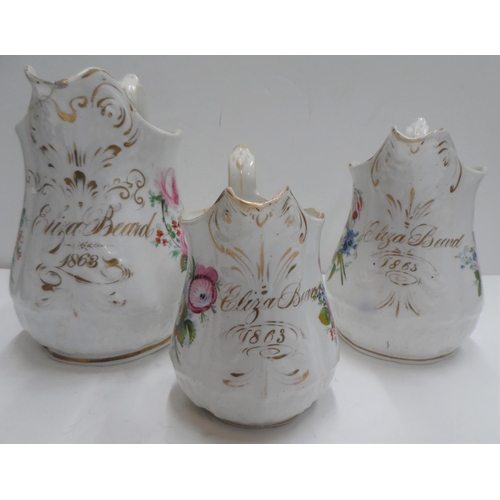 187 - Set of 3 graduating ceramic Victorian jugs, all hand painted & all signed & dated 