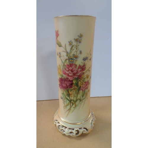 188 - A Royal Worcester cylindrical vase, decorated with a spray of wild flower, raised on a gilt pierced ... 