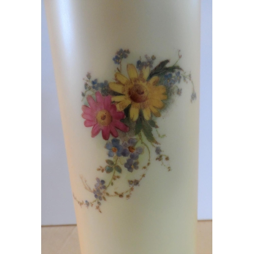 188 - A Royal Worcester cylindrical vase, decorated with a spray of wild flower, raised on a gilt pierced ... 