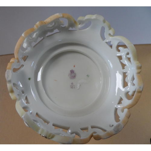 188 - A Royal Worcester cylindrical vase, decorated with a spray of wild flower, raised on a gilt pierced ... 