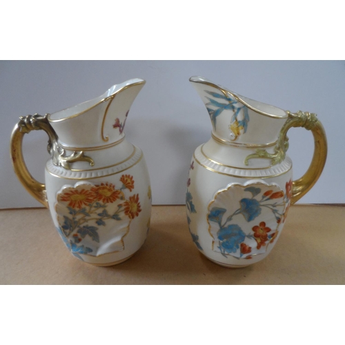 189 - Pair of Royal Worcester jugs, circa 1892, shape number 1437, height 16 cm,

Condition - both jugs ap... 