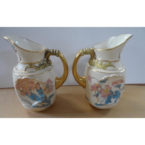189 - Pair of Royal Worcester jugs, circa 1892, shape number 1437, height 16 cm,

Condition - both jugs ap... 